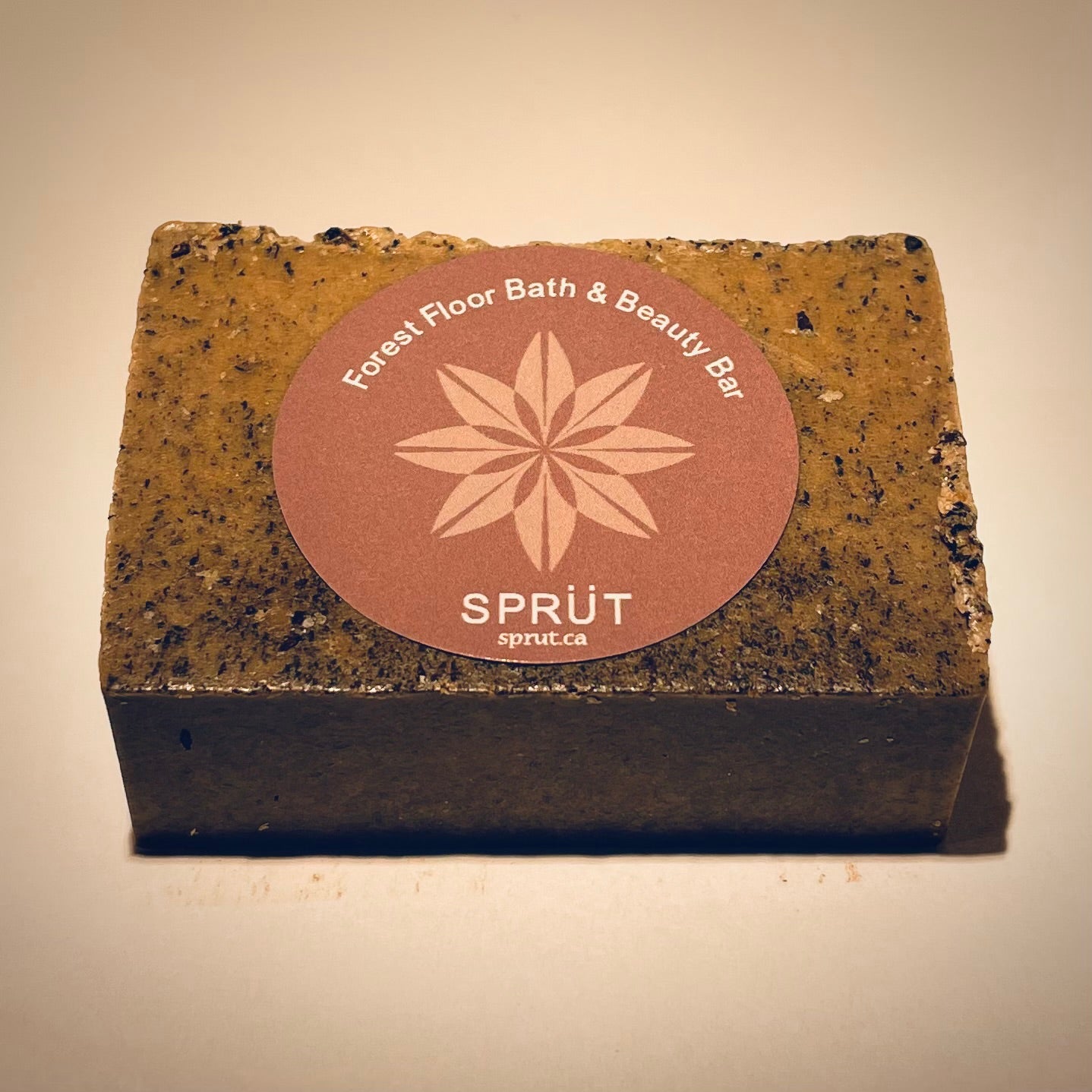 Bar of soap with 'Sprüt' label showing detailed texture